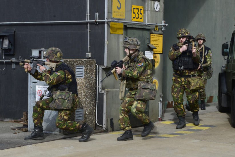 Members of the Royal Netherlands Air Force 1st  Fighter Wing participate in a 'strike load and recap’ exercise to showcase their procedures and response times for dealing with intruders at Volkel Air Base in the Netherlands.